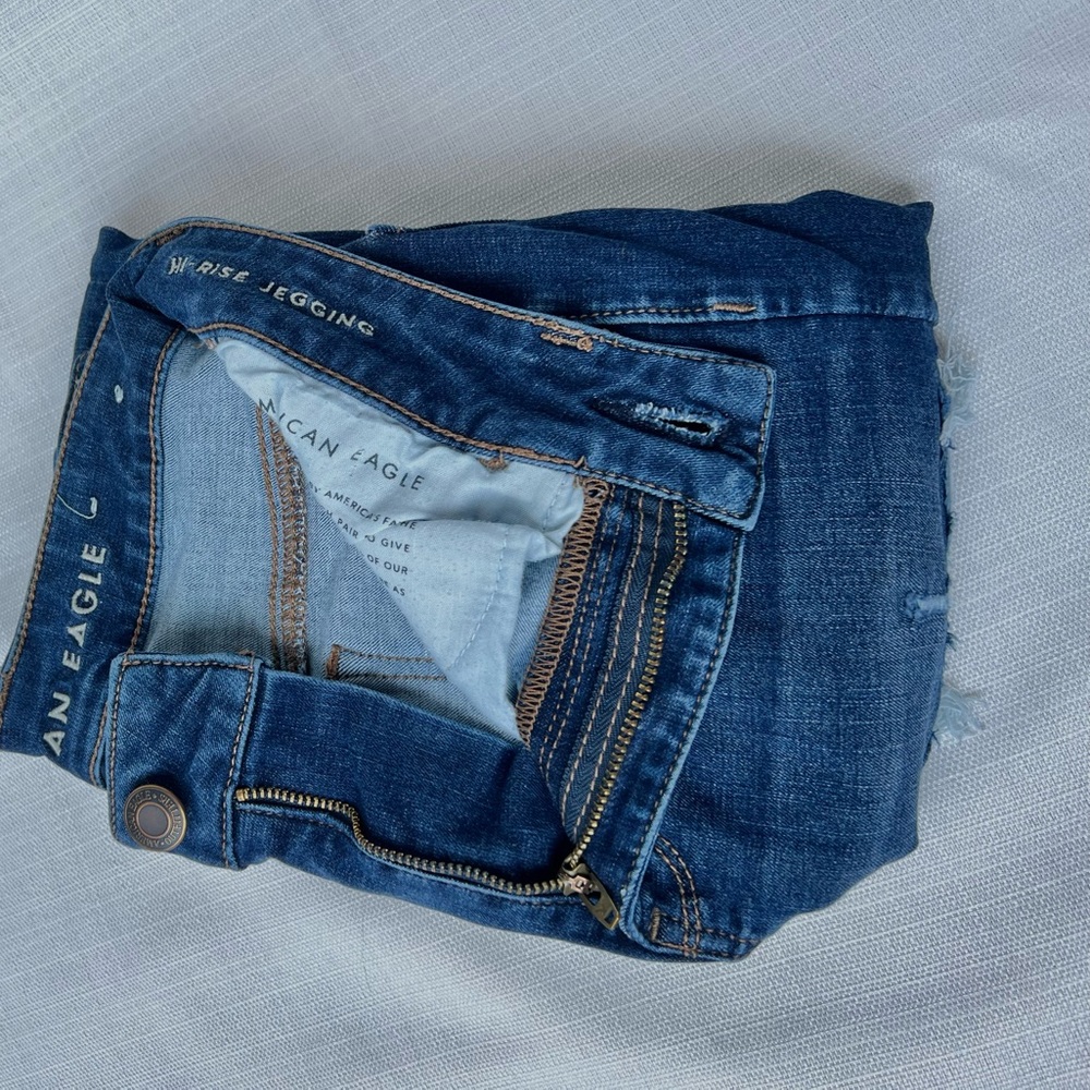American Eagle high rise jegging with distressed but covered up in a size 2